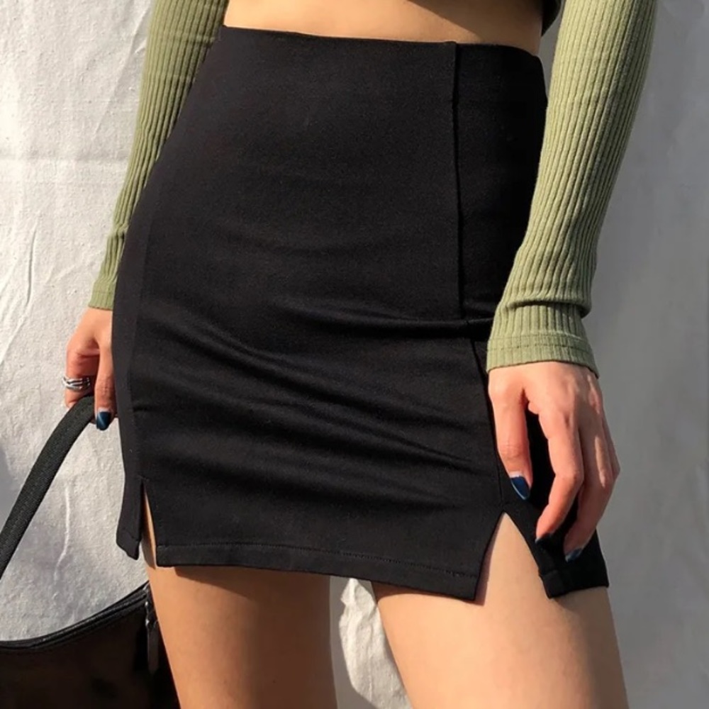 I’m selling a black two slit mini skirt.